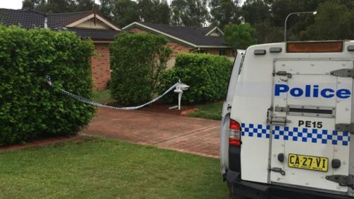 Police outside the Glenmore Park home. (9NEWS)