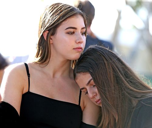 Isabella Vanderlaat 15, Gabriella Benzeken, 15, both students of Scott Beigel, the 35-year-old geography teacher who was killed during the shooting. (AAP)