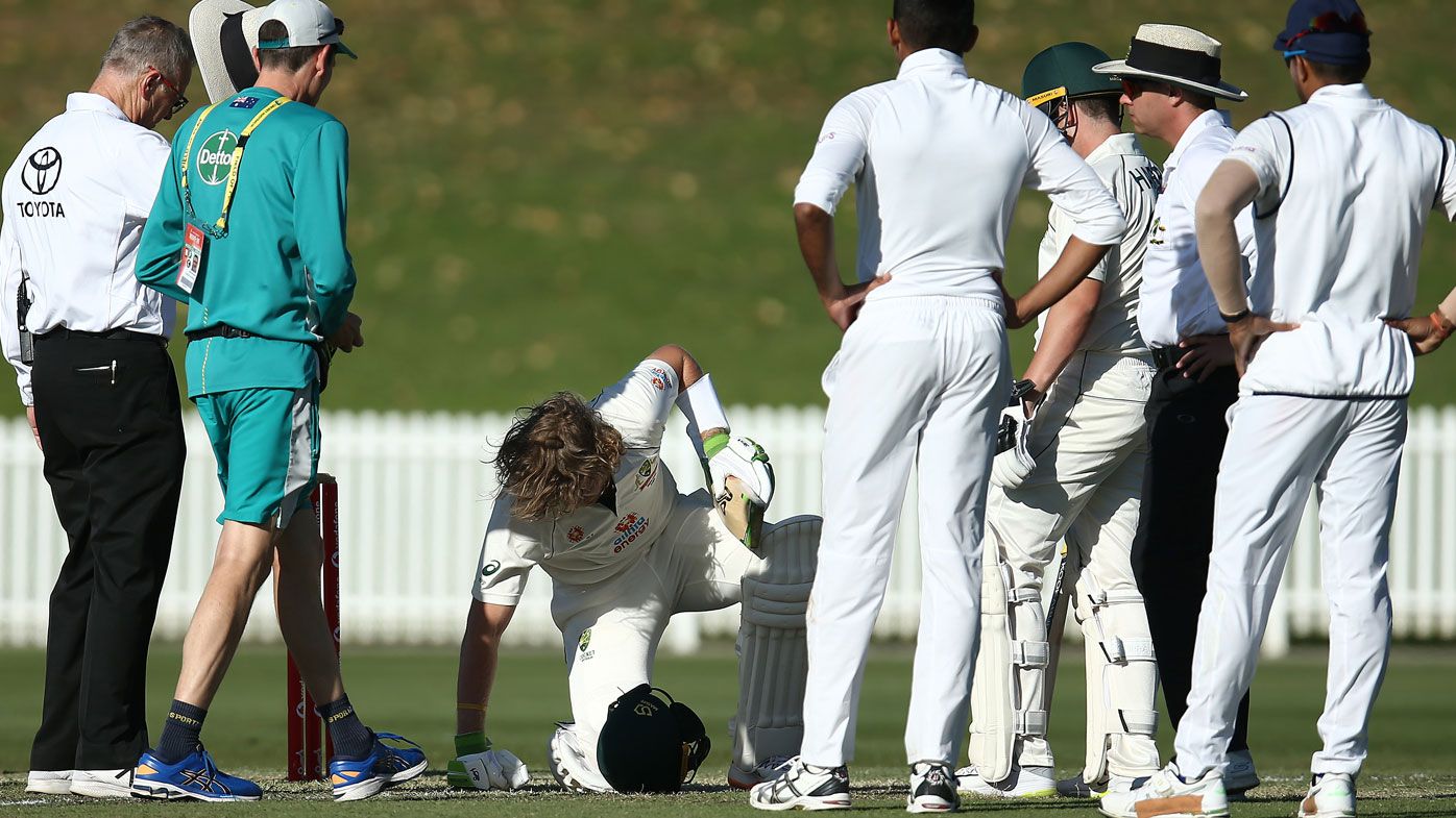 Will Pucovski goes down after being struck by a bouncer. (Getty)