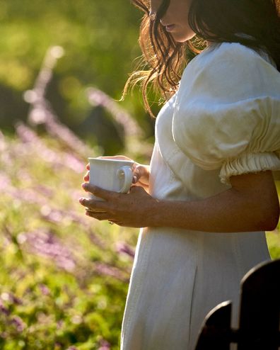 Meghan, the Duchess of Sussex, pictured holding a mug - likely to be a new product from her As ever range, coming soon.