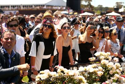Most race-goers donned the traditional black and white.