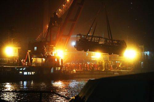 Rescuers lifted the wreck of the bus from the river Wednesday night local time. Thirteen bodies have been found and two remain missing, the official Xinhua News Agency said.