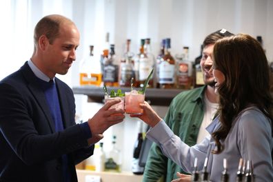 Prince William, Prince of Wales and Catherine, Princess of Wales, make cocktails during a visit to the Trademarket outdoor market, as part of the royal visit to Northern Ireland on October 6, 2022 in Belfast, Northern Ireland