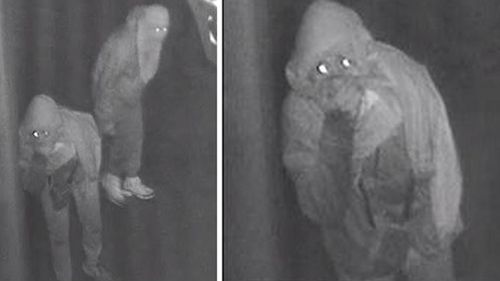 The men were seen sneaking around the taxi depot. (Victoria Police)