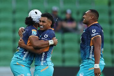 Moana Pasifika players react after winning the round two Super Rugby Pacific match against the Fijian Drua.