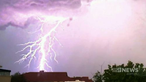 Dark skies were filled with light and bolts of lightning cracked through the sky. (9NEWS)