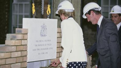 Diana, Princess of Wales lays a ceremonial foundation stone in a wall at the Royal Marsden Hospital in London, 6th June 1990