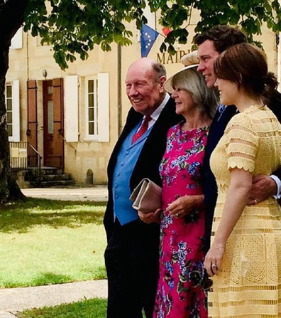 Eugenie pictured with her in laws and husband Jack.