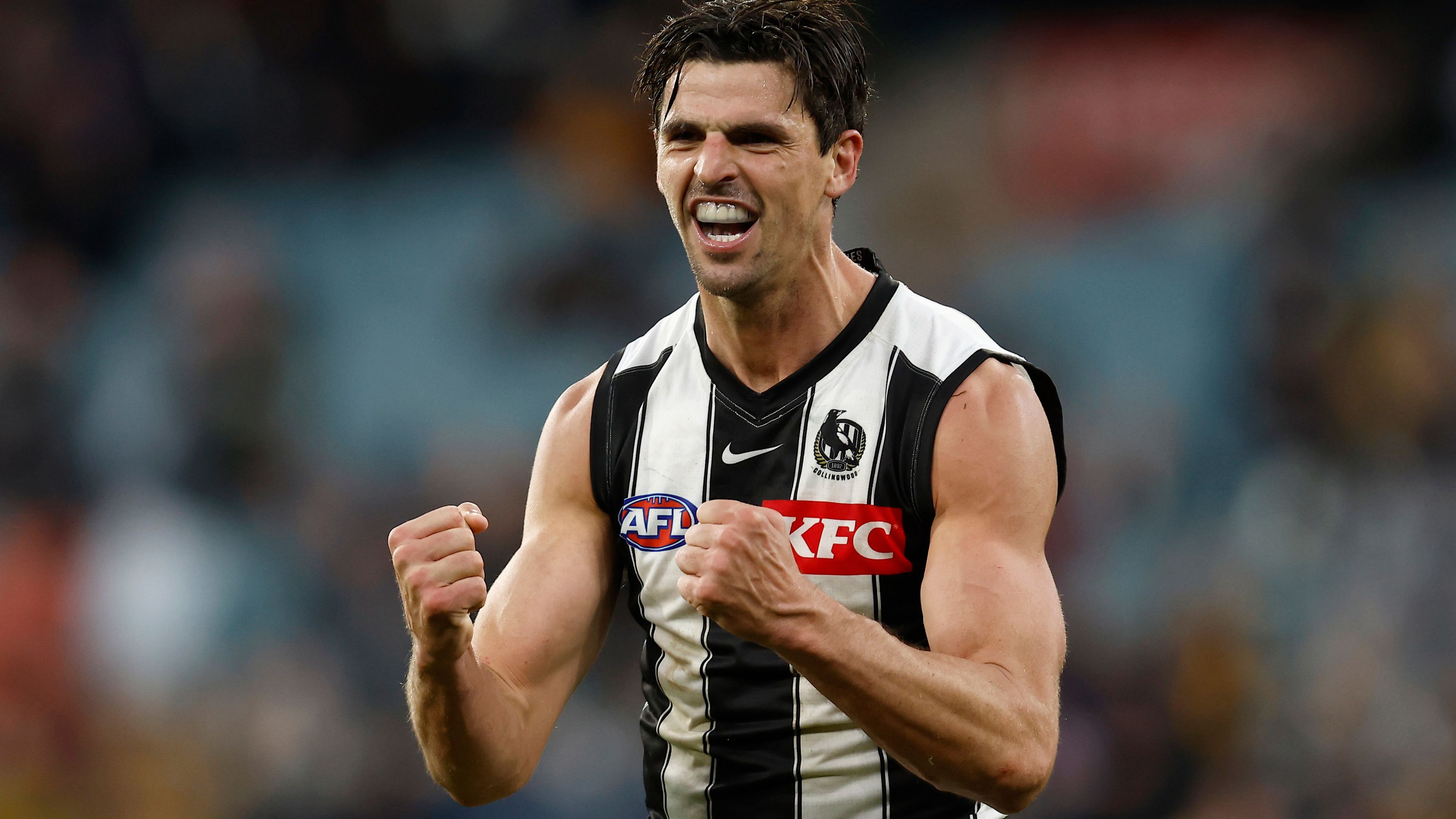 Scott Pendlebury of the Magpies  celebrates on the  final sirern during the round 12 AFL match between the Hawthorn Hawks and the Collingwood Magpies at Melbourne Cricket Ground on June 05, 2022 in Melbourne, Australia. (Photo by Darrian Traynor/Getty Images)