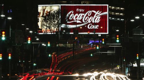 Iconic Kings Cross Coca-Cola sign to be sold off for charity