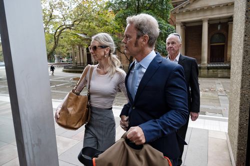 Craig McLachlan and his wife Vanessa Scammell enter Supreme Court on Wednesday May 11.