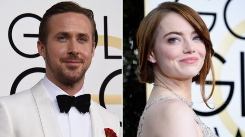 Ryan Gosling and Emma Stone at the awards ceremony. (AFP)