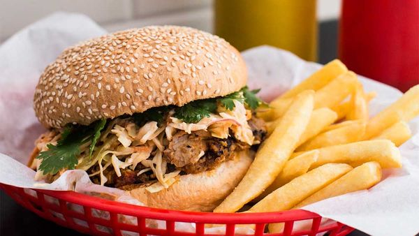 Pulled pork burger with apple slaw and Russian dressing. Image: Southern Highlands Cookbook