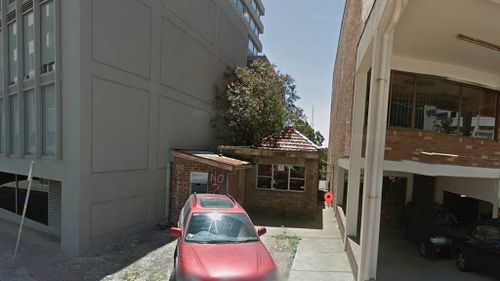 ‘Can you lend me a few bob to buy this home, I’m a little short’: Tiny Sydney house overshadowed by skyscrapers expected to fetch $3.5 m