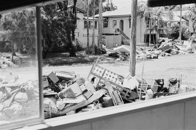 The piles of destroyed possessions line the street outside Rebecca Rushbrook's home in Lismore.