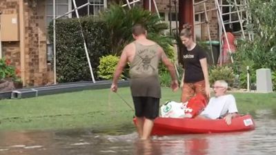 Locals help each other during floods