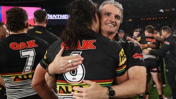 SYDNEY, AUSTRALIA - OCTOBER 02: Jarome Luai of the Panthers and Panthers coach Ivan Cleary embrace as they celebrate victory in the 2022 NRL Grand Final match between the Penrith Panthers and the Parramatta Eels at Accor Stadium on October 02, 2022, in Sydney, Australia. (Photo by Mark Kolbe/Getty Images)