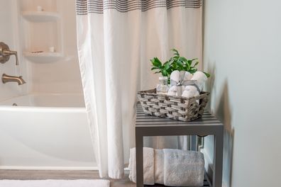 Clean and bright bathroom decor in gray and white