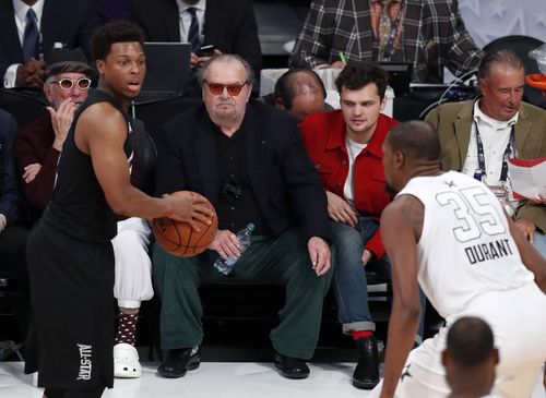 Jack Nicholson watches the action from the sidelines. (AAP)