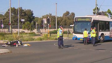 Motorcyclist dies after crash with bus in Kensington, Sydney.