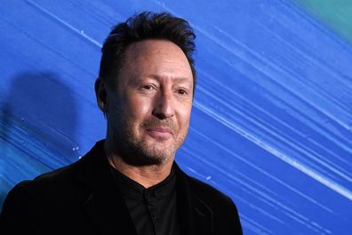 Singer Julian Lennon poses at the amfAR Gala.