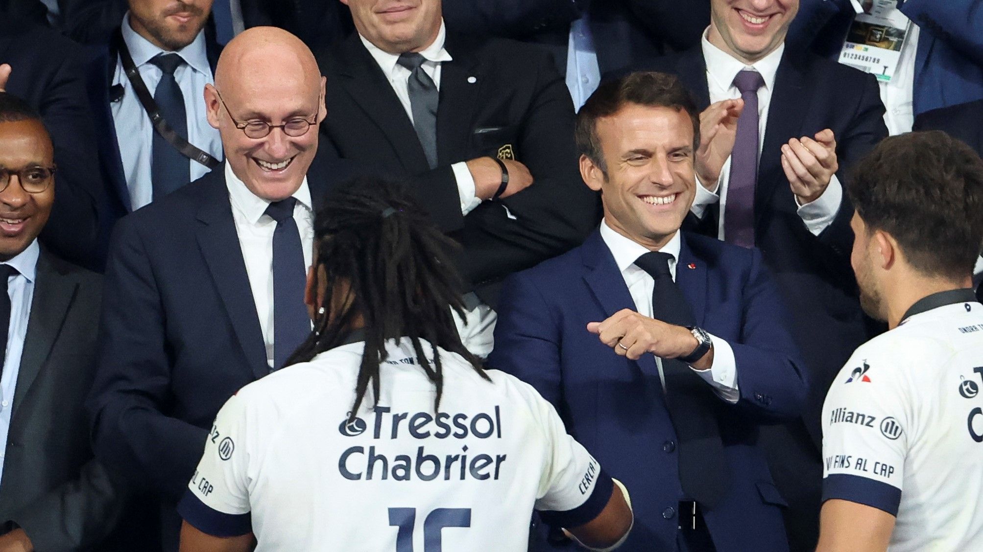 President of French Rugby Federation FFR Bernard Laporte (left) with French President Emmanuel Macron during the trophy ceremony following the Top 14 Final rugby match at Stade de France.