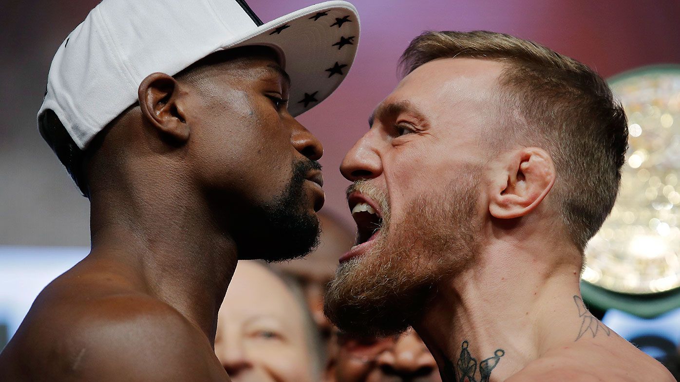 Floyd Mayweather Jr and Conor McGregor face off