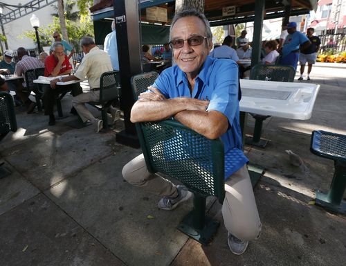 Diaz poses at Domino Park on Calle Ocho in the Little Havana neighborhood of Miami, near where the raid took place. Picture: AP