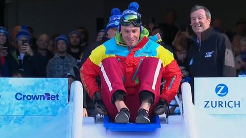 Simon Goodwin wore a winter-ready ski suit for the occasion. (9NEWS)