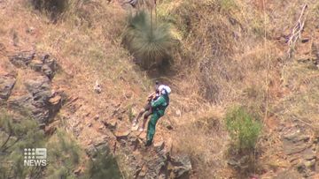 Woman rescued by helicopter after falling