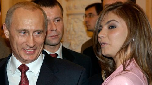 Russian President Vladimir Putin with Alina Kabayeva in 2004. (AAP)