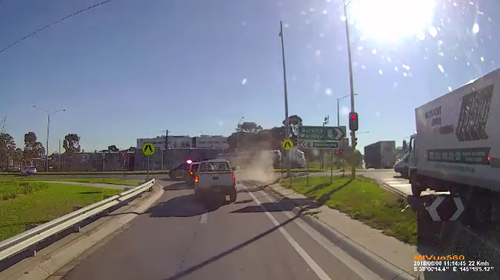 The police cruiser dodged through traffic trying to catch up to the offenders. Picture: 9NEWS