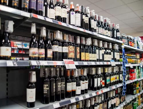 Wine bottle on shelf. Maureen McLean/Alamy Live News