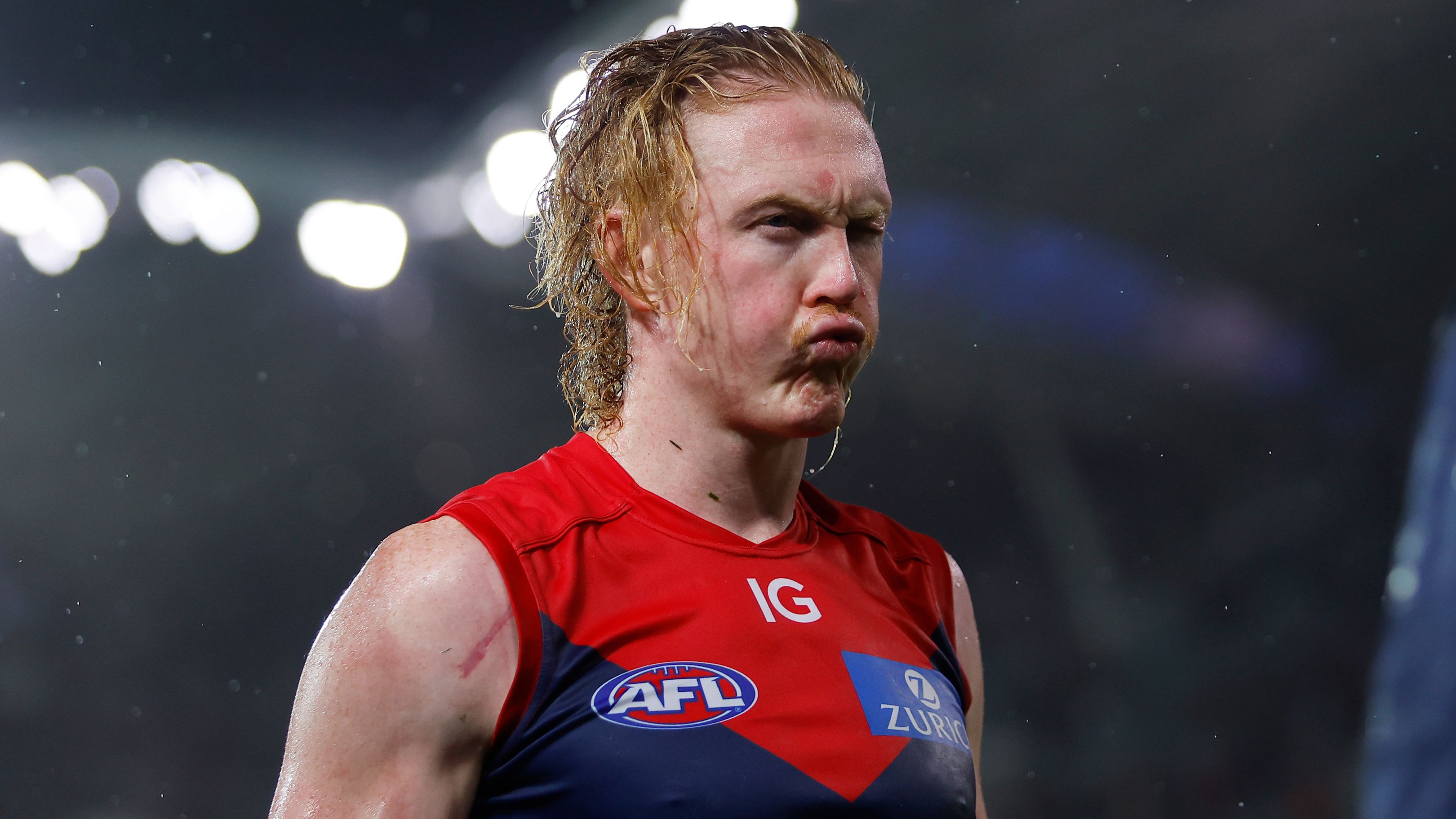 ADELAIDE, AUSTRALIA - APRIL 15: Clayton Oliver of the Demons leaves the field after a loss during the 2023 AFL Round 05 match between the Essendon Bombers and the Melbourne Demons at Adelaide Oval on April 15, 2023 in Adelaide, Australia. (Photo by Dylan Burns/AFL Photos)