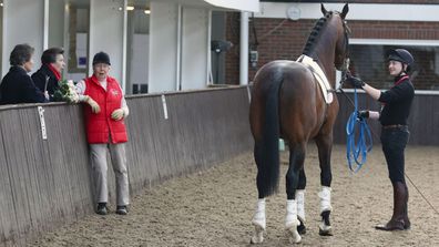 Britain's Princess Anne, Vice-Patron of the equine charity The British Horse Society, talks to Jennie Loriston-Clarke as she visits the Addington Equestrian Centre near Buckingham
