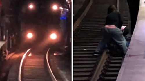 Sydney train nearly crashes into commuter who has called onto tracks.