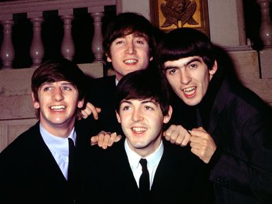 Rock and roll band "The Beatles" pose for a portrait wearing suits in circa 1964. (L-R) Ringo Starr, John Lennon, Paul McCartney, George Harrison.