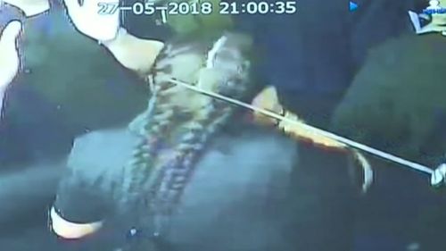 One female staff member was repeatedly prodded in the face and hair with the samurai sword. Picture: 9NEWS