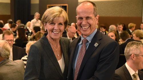 Foreign Affairs Minister Julie Bishop and journalist Peter Greste at the National Press Club in Canberra, Thursday, March 26, 2015. (AAP Image/Mick Tsikas)