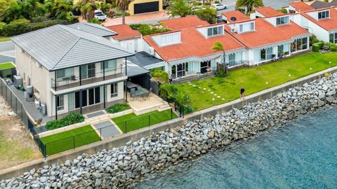 Waterfront property beach house affordable housing Australia real estate