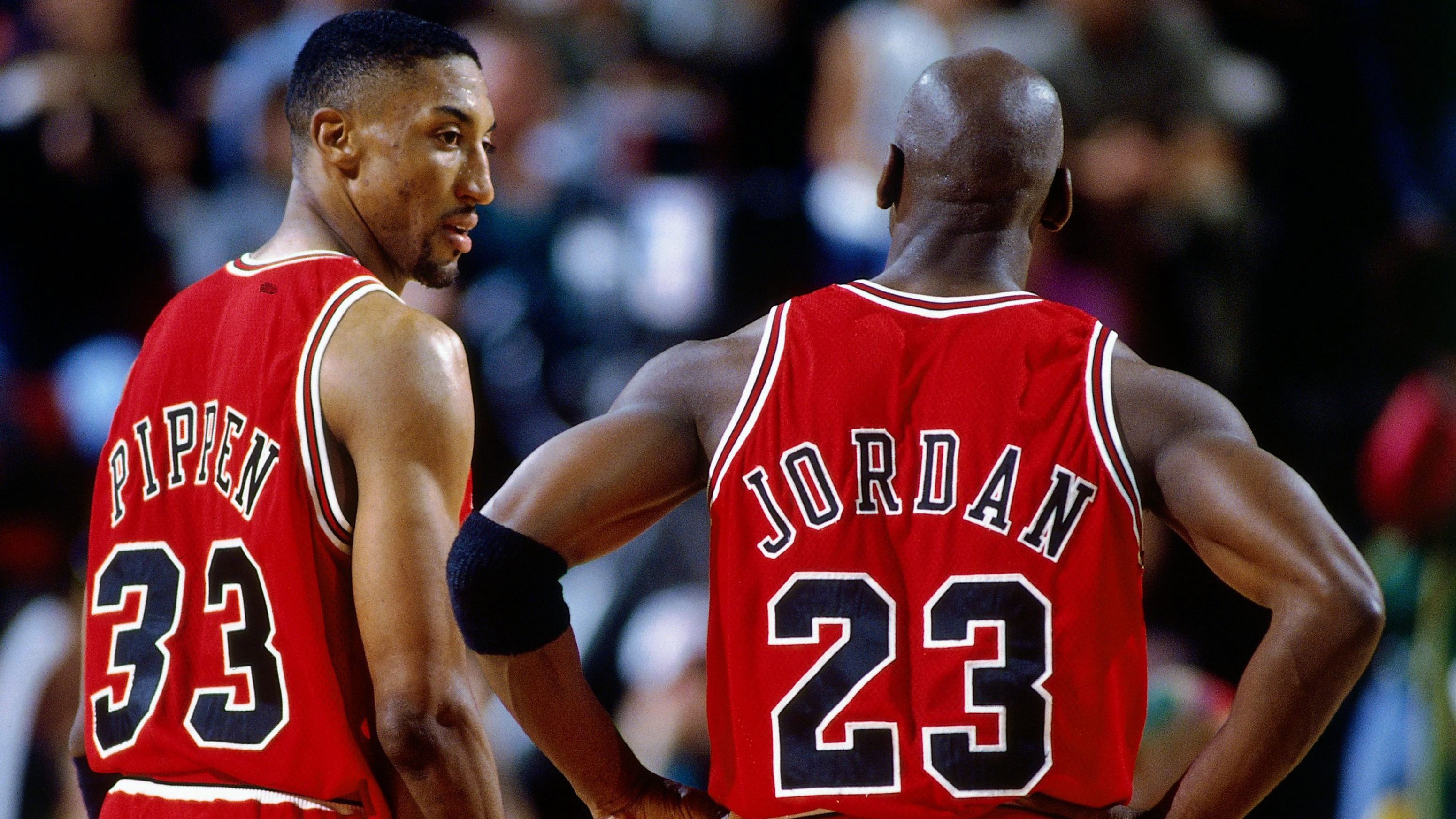 SEATTLE - JUNE 14:  Michael Jordan #23 and Scottie Pippen #33 of the Chicago Bulls discuss strategy against the Seattle SuperSonics in Game Five of the 1996 NBA Finals at Key Arena on June 14, 1996 in Seattle, Washington. The Sonics won 89-78.  NOTE TO USER: User expressly acknowledges that, by downloading and or using this photograph, User is consenting to the terms and conditions of the Getty Images License agreement. Mandatory Copyright Notice: Copyright 1996 NBAE (Photo by Barry Gossage/NBAE