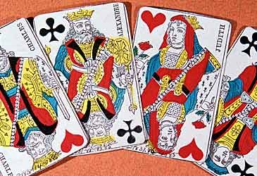 Where did the style of playing cards illustrated above originate?