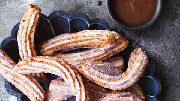 Annie Rigg's orange-scented churros with caramel orange chocolate sauce