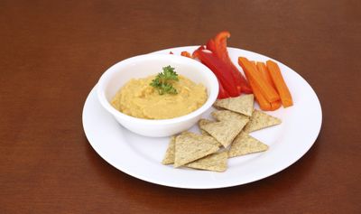 <strong>Vegetable sticks and
wholegrain crackers with hummus, salsa or tzatziki</strong>