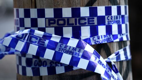Two men hit with a hammer in violent home invasion on the Gold Coast