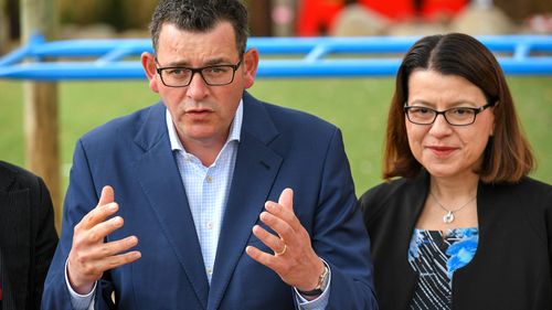 Premier Daniel Andrews and Jenny Mikakos in happier and more simple times, before the pair's political relationship fell apart during the coronavirus pandemic