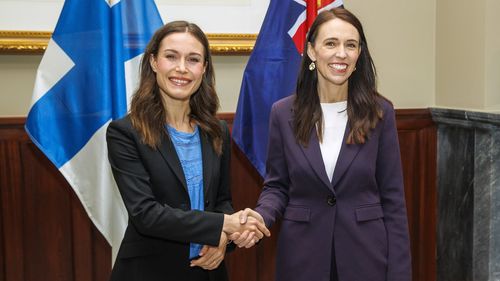 Finnish Prime Minister Sanna Marin (left) and New Zealand Prime Minster Jacinda Ardern (right) pose for a portrait at Government House on November 30, 2022 in Auckland, New Zealand. 