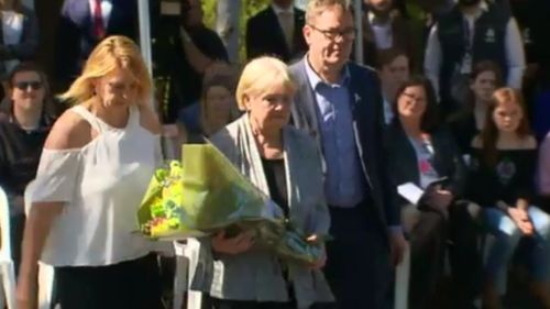 Constable Tynan's mother laid flowers for her son.