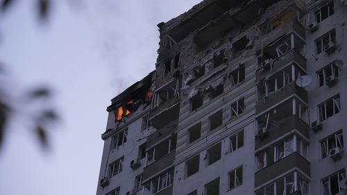 The photo shows a multi-story apartment building which was damaged during Russian attack in Kyiv, Ukraine, Tuesday, May 30, 2023.