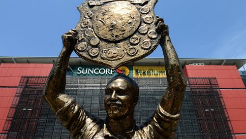 Bronze statue of Rugby League great Wally Lewis in front of Suncorp Stadium. Picture: AAP